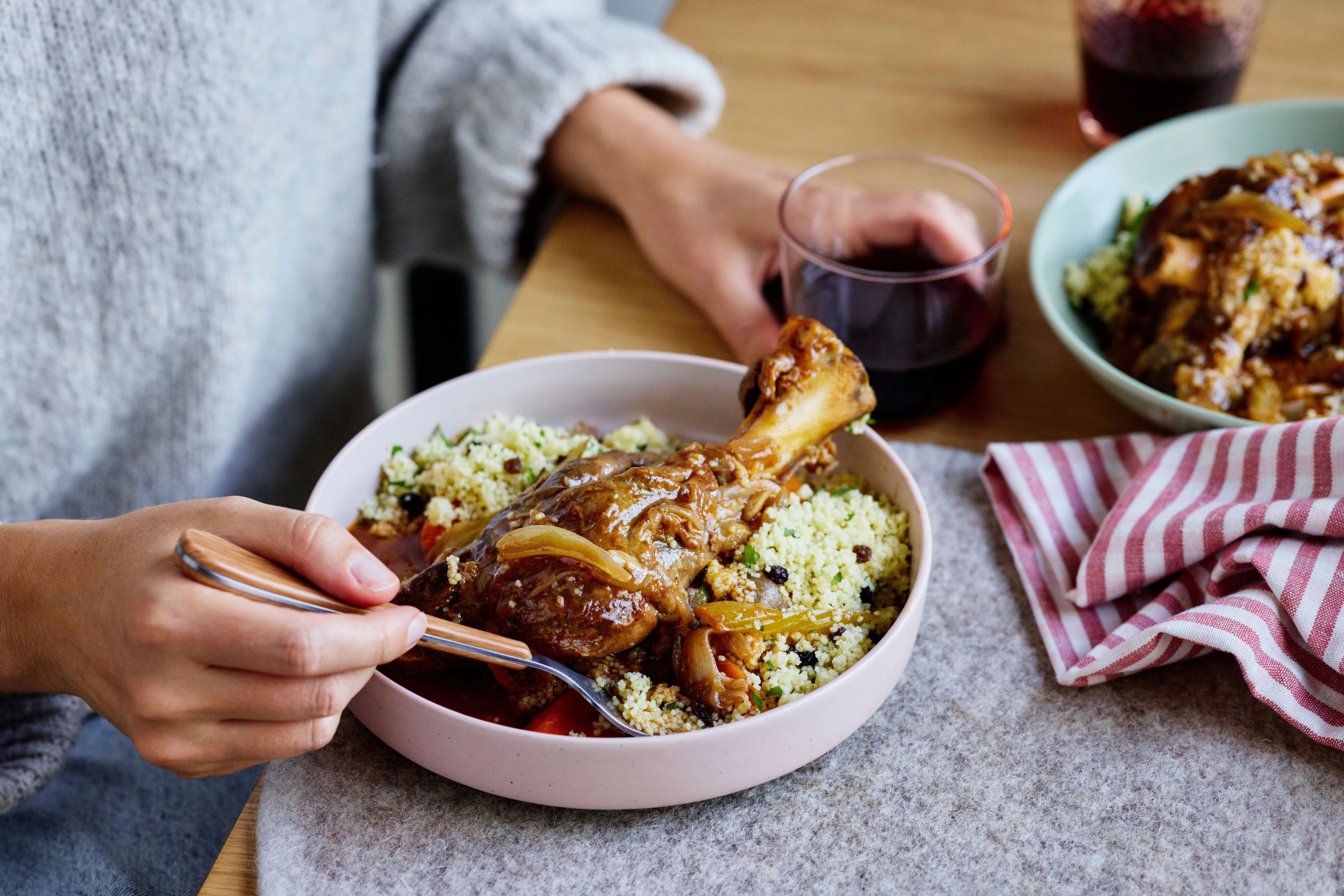 Slow-Cooked Pomegranate Lamb Tagine with Herby Couscous